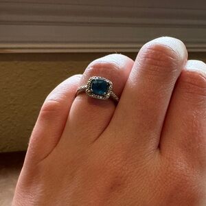 Elegant Blue Topaz with Diamond Accents Ring